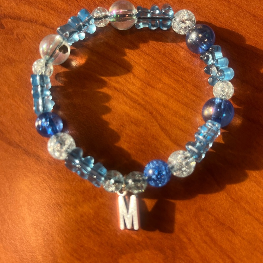 Blue Beaded Bracelet with Silver Charm